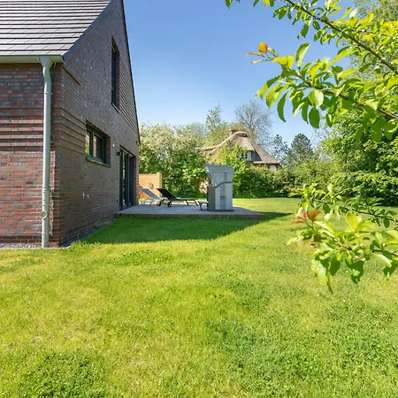 Huus * Risum-Lindholm